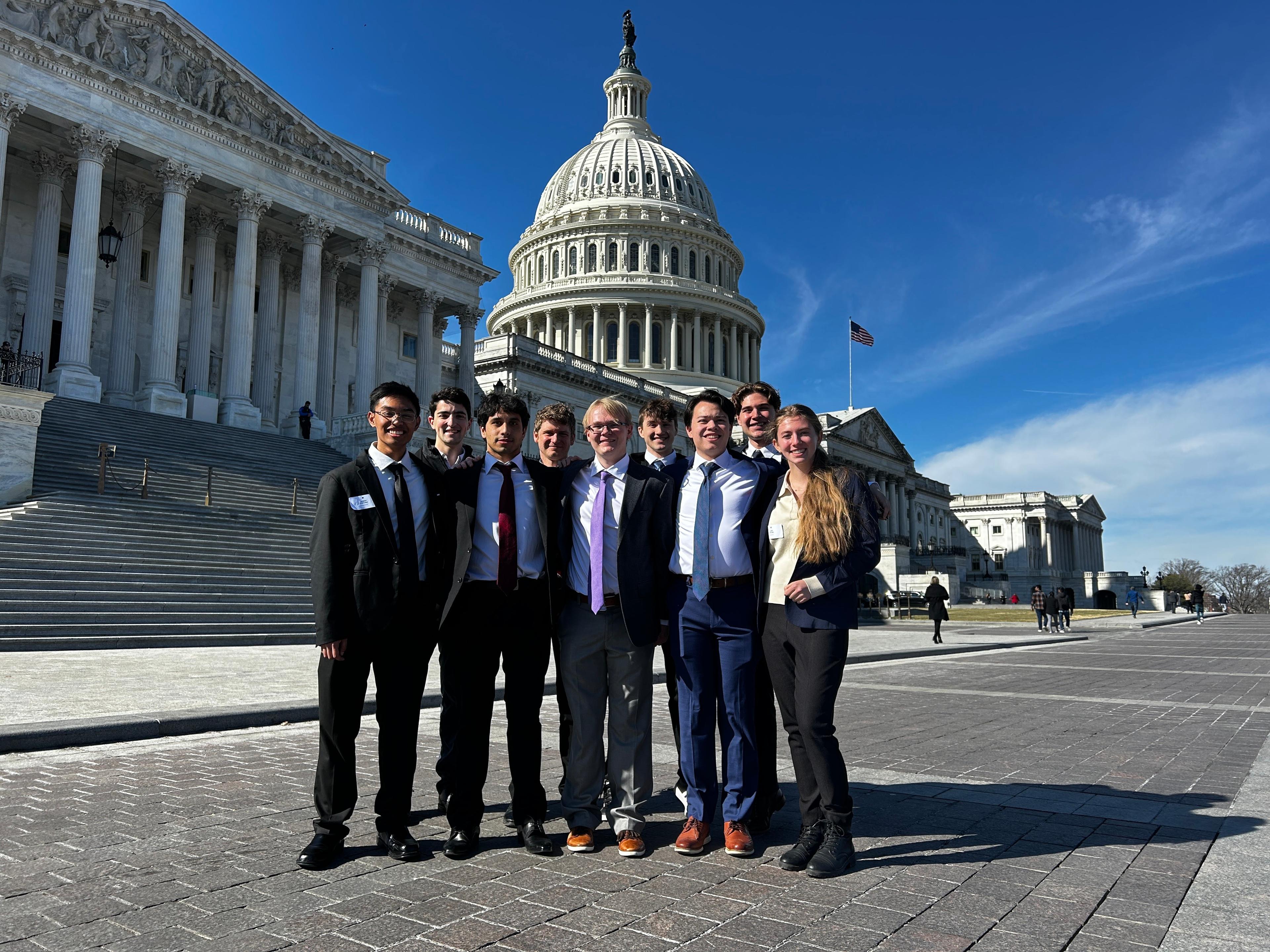 Nine WAISI members in front of the US Capitol